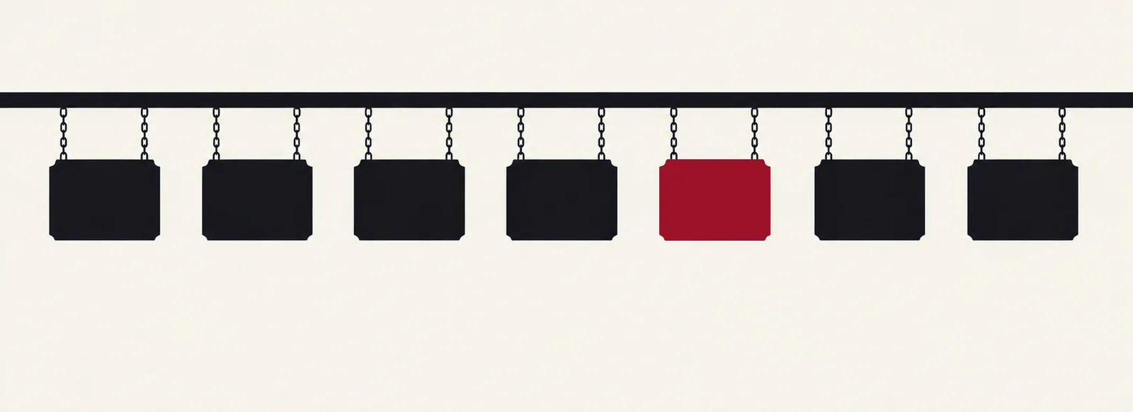 Seven identical hanging shop signboards in a row; the one just right of center is solid crimson.